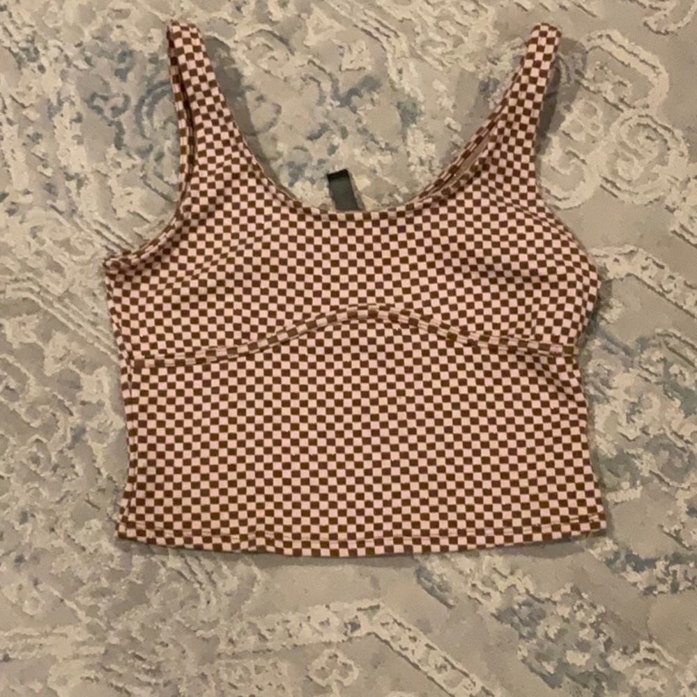 Brown sleeveless crop tank top with scoop neck and fitted style